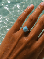 THE FOUR GLEAMS OF A PEARL RING
