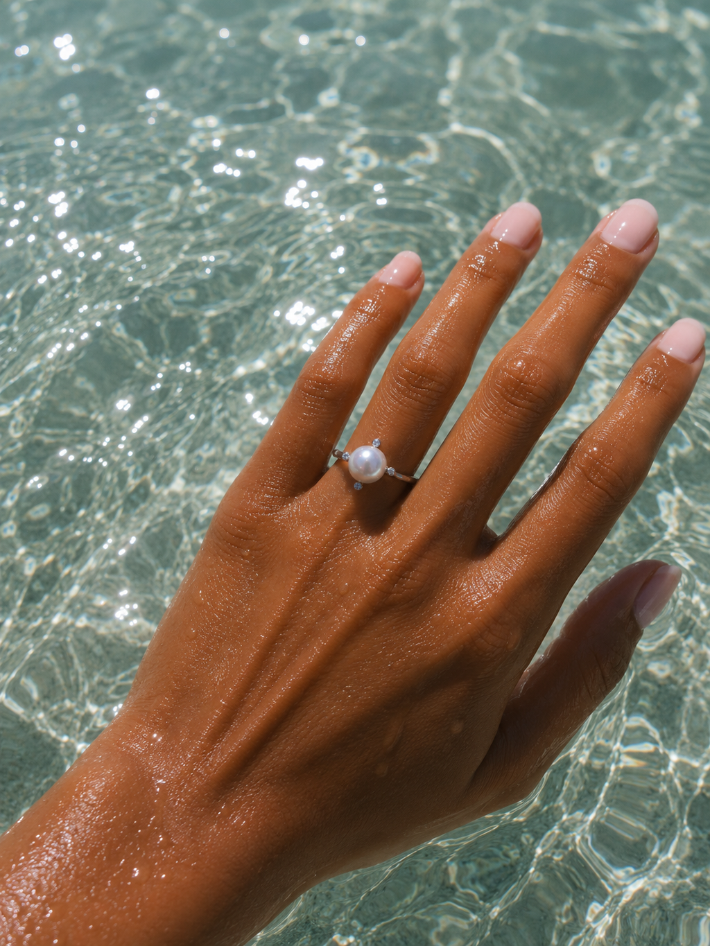 THE FOUR GLEAMS OF A PEARL RING