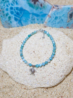 BRACELET FACETED LARIMAR WITH CHARM