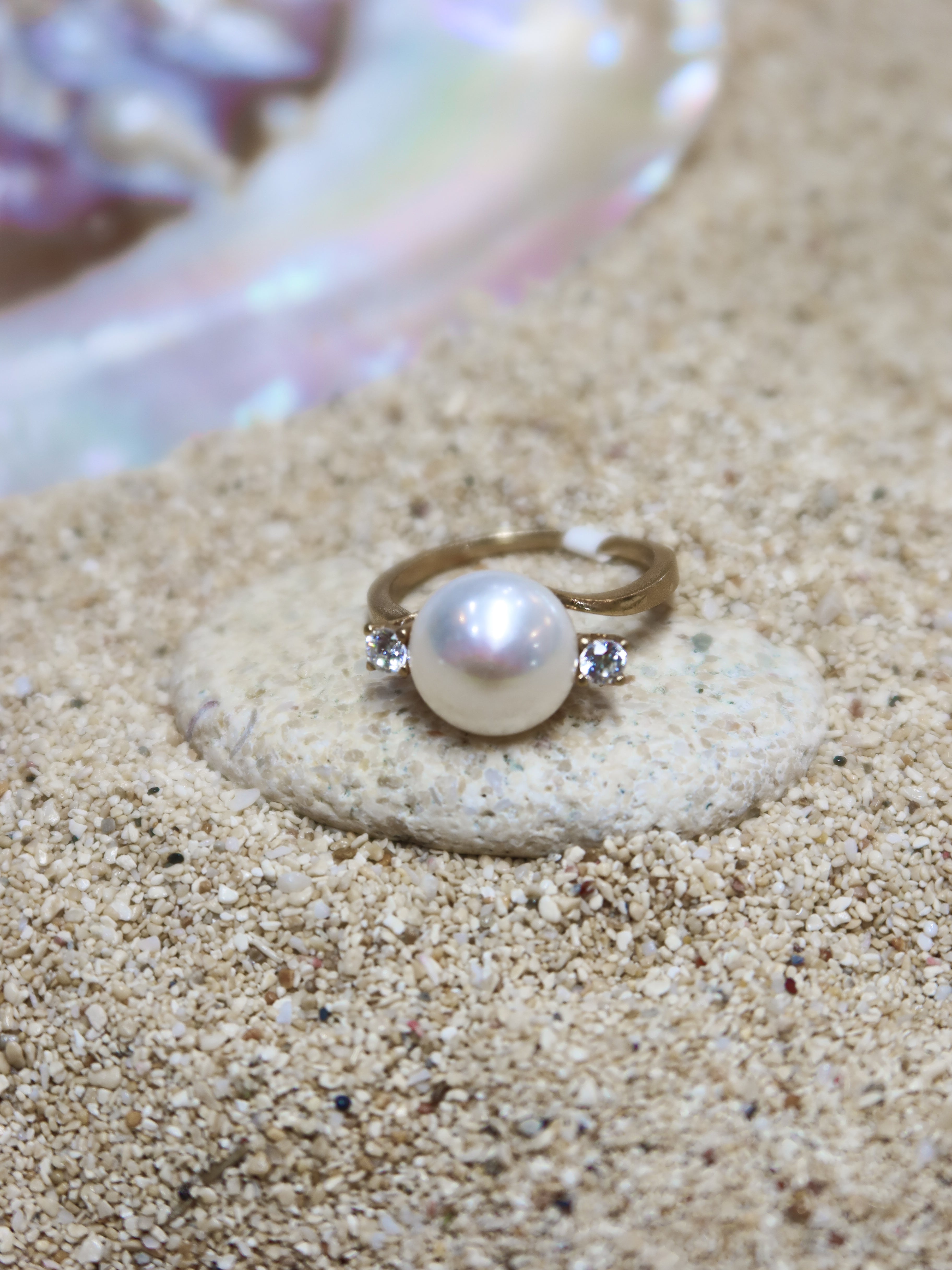 THE TWO GLEAMS OF A PEARL