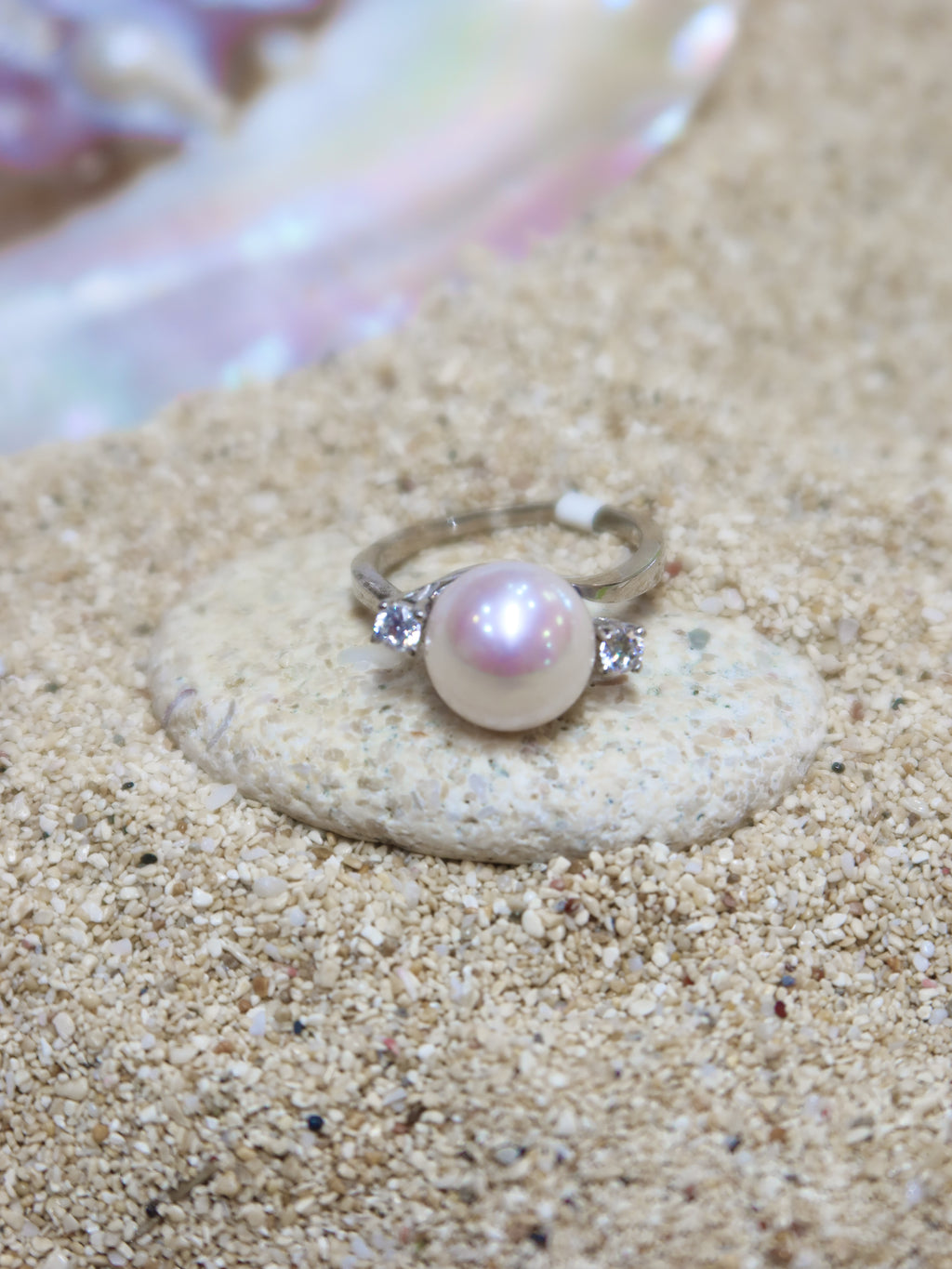 THE TWO GLEAMS OF A PEARL