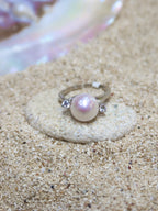 THE TWO GLEAMS OF A PEARL