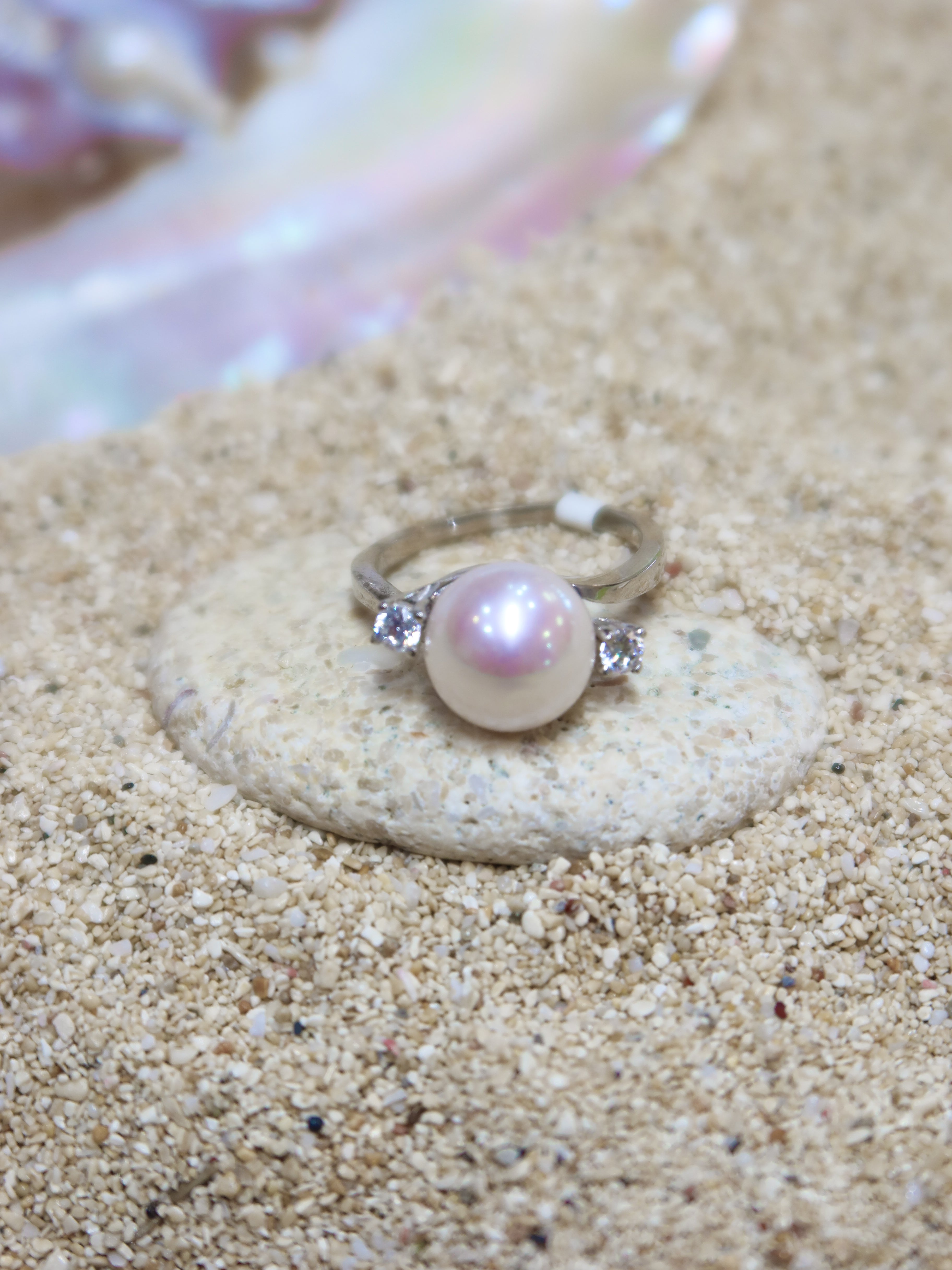 THE TWO GLEAMS OF A PEARL
