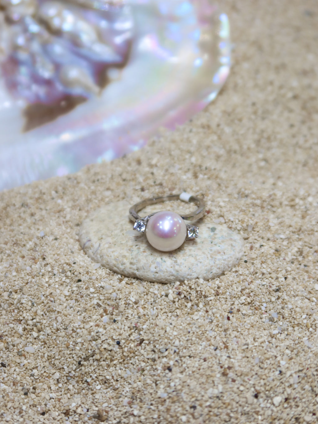 THE TWO GLEAMS OF A PEARL