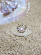 THE TWO GLEAMS OF A PEARL