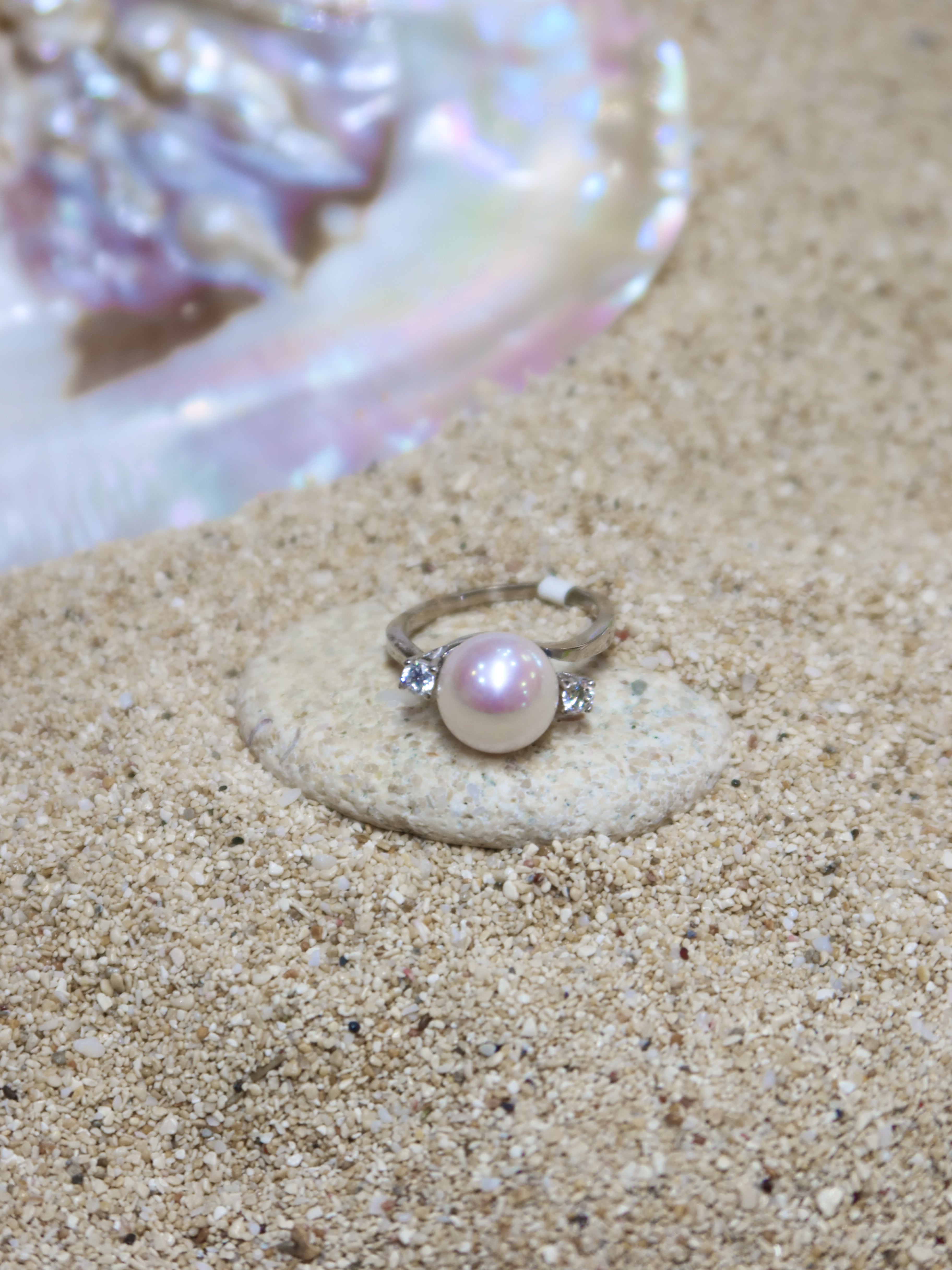 THE TWO GLEAMS OF A PEARL